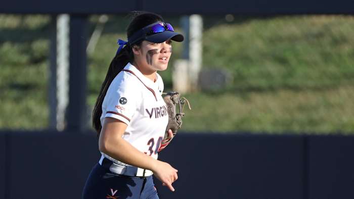 Kelly Ayer runs in the outfield during the Virginia softball game against Longwood at Palmer Park.
